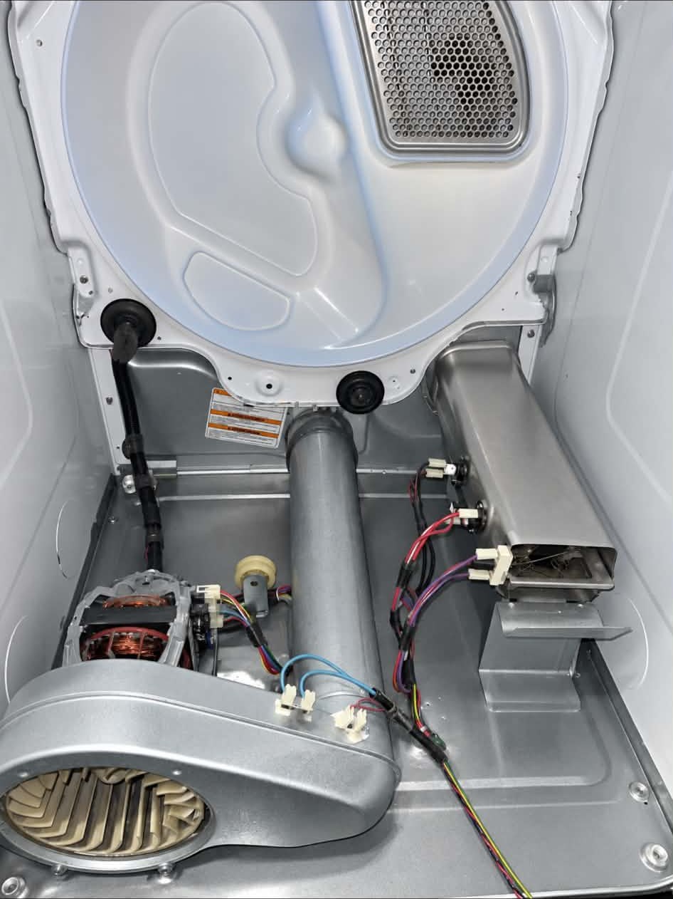 The same dryer interior, spotless after cleaning